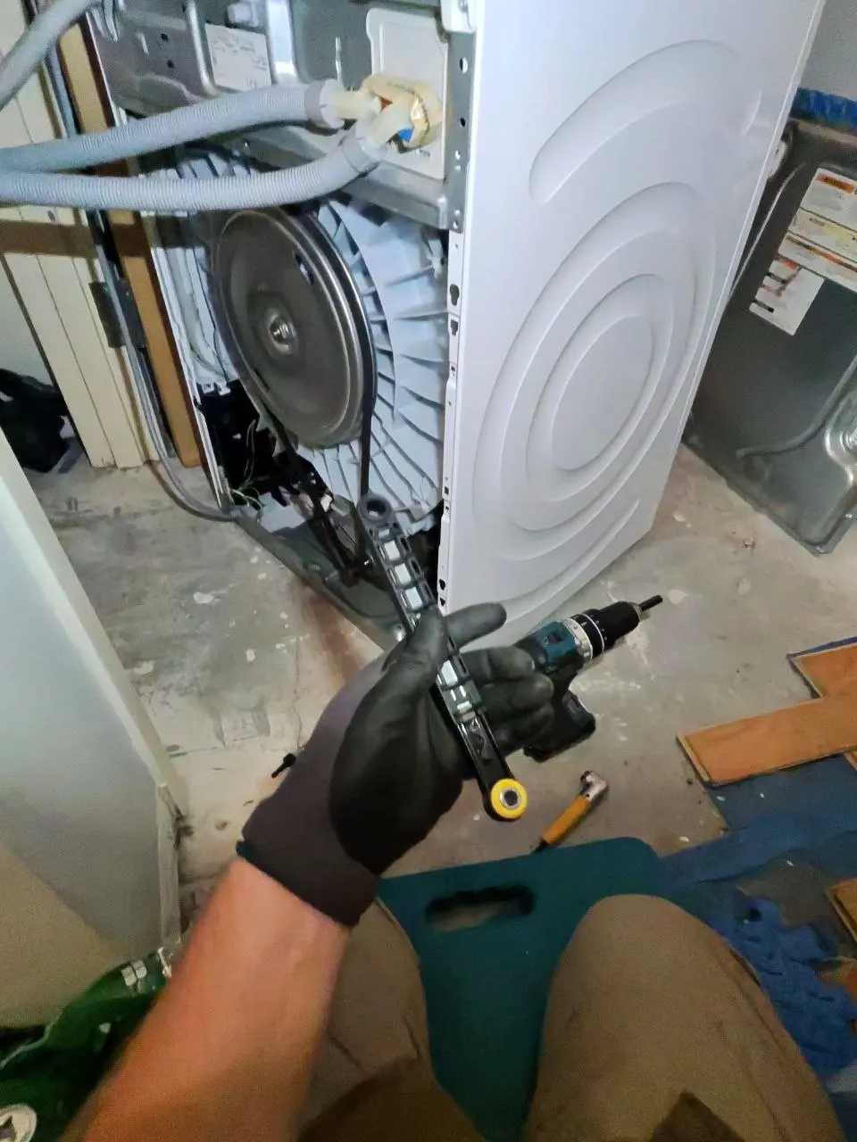 Bosch Washer Leak – Disconnected Drain Hose and Shock Absorber Repair in Prospect Heights